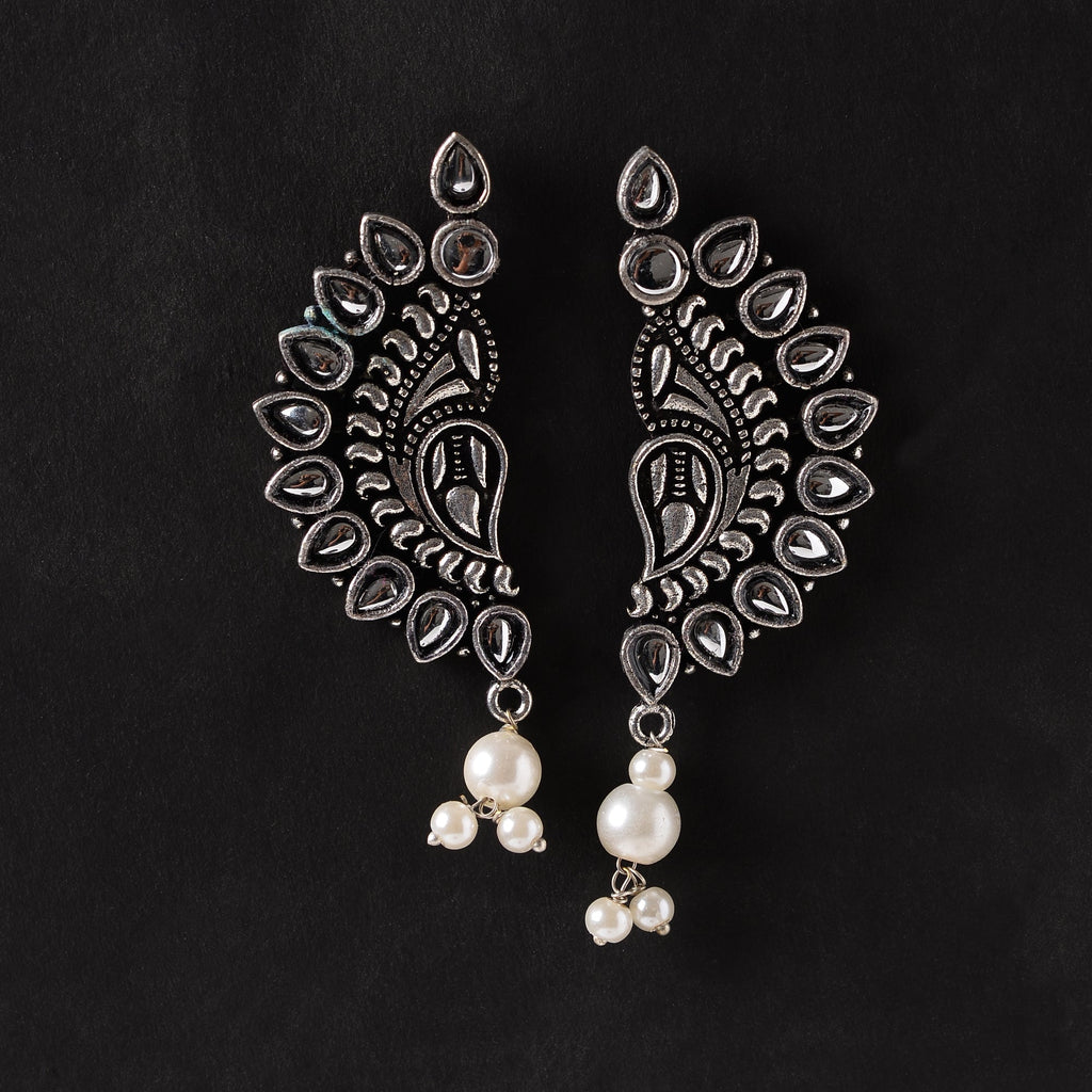 Traditional twirls- Handing pearl oxidised stud earrings